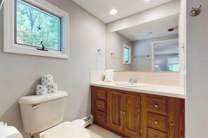Shower, towels - Charming coastal home near pond with sunroom, open layout, yard & AC (Yarmouth)