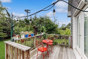 Outdoor dining - Spacious home in central location with beautiful patio, pool table, W/D, & AC (Oak Bluffs)