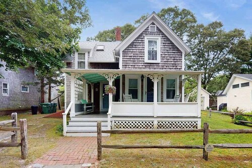 Inviting, two-story home with a large yard, sunroom, balcony