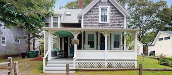 Inviting, two-story home with a large yard, sunroom, balcony