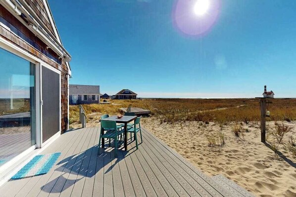 Outdoor dining - Cozy cottage steps to the beach with patio, W/D, & partial AC (North Truro)