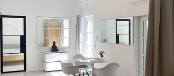 Loft in former wine distillery. At ground level in the inner courtyard on the market square.