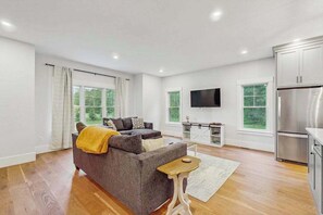 TV, offices - Modern Luxe on the Cape | Sleek Design, Central Air, Serene Views (Mashpee)