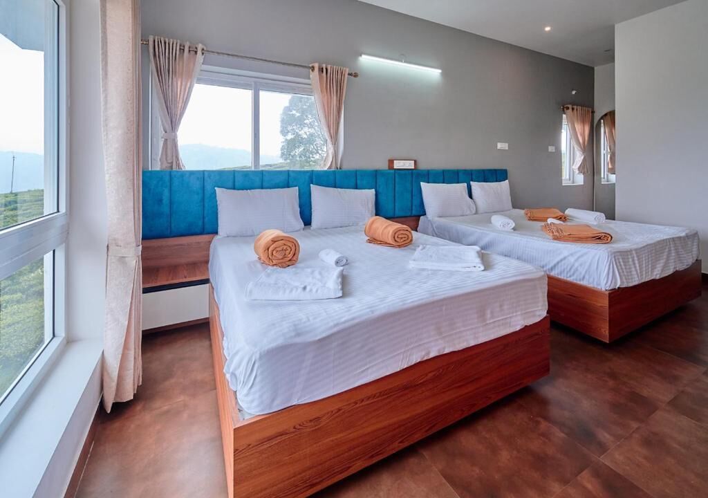 Suite, 2 chambres, balcon, vue jardin | Bureau, Wi-Fi gratuit, draps fournis