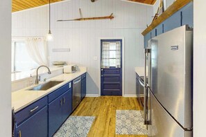 Fridge, microwave, oven, stovetop - Remodeled, ocean view home with rooftop deck & fast WiFi - dog-friendly (Virginia Beach)