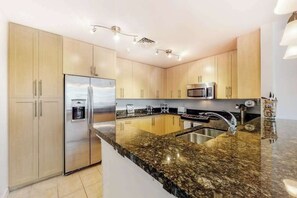 Fridge, microwave, oven, stovetop - Beach condo with pool views, balcony, outdoor pool & gym (Virginia Beach)