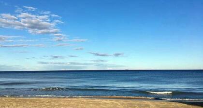 Ocean-view home that is within a 2 minute walk to the beach w/rooftop deck