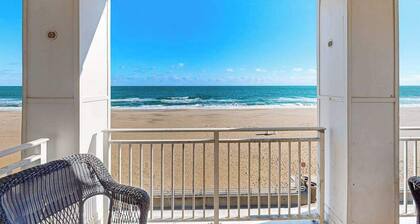 Beachfront 2nd-floor condo with ocean views, balcony, 3 pools & gym