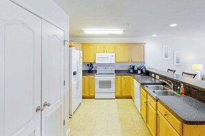 Fridge, microwave, oven, stovetop - 1st-floor Seaside condo 1 block from beach with pool & private deck (Virginia Beach)