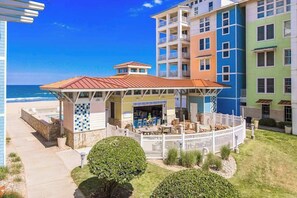 Outdoor dining - Oceanfront condo with 2 balconies, beach views, W/D & pool & gym (Virginia Beach)