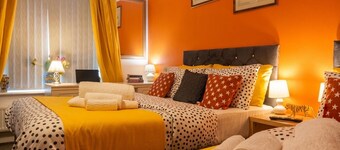 Award-winning home with free parking, EV charging, and space for ten
