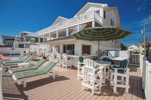 Outdoor dining - Oceanfront home with pool, hot tub, central AC, & furnished deck - near shopping (Virginia Beach)
