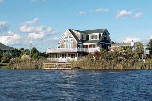 Incredible bayfront home with private dock, pool & 2 fireplaces