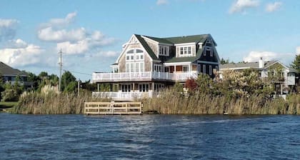 Incredible bayfront home with private dock, pool & 2 fireplaces