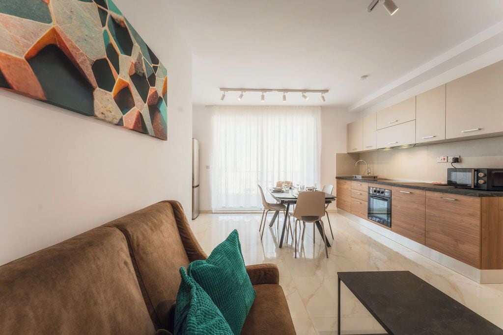 Deluxe appartement, uitzicht op zee | Woonruimte