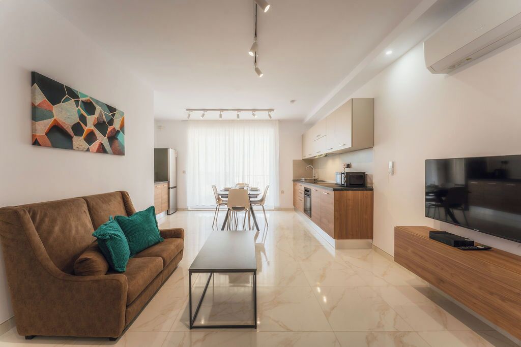 Appartamento Deluxe, vista mare | Area soggiorno