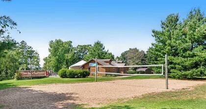 Golf course-front condo with pool, hot tub, dock, tennis, golf, & private beach
