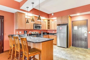 Fridge, microwave, oven, stovetop - Riverside resort condo with on-site golf, dining (Wisconsin Dells)