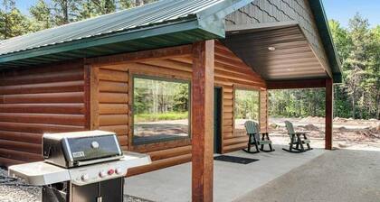 Contemporary dog-friendly cabins with hot tub, fireplaces, patios, & game room