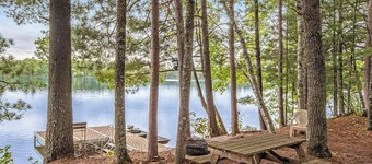 Designer cottage on Statenaker Lake with dock access, trails, & Norwegian Sauna