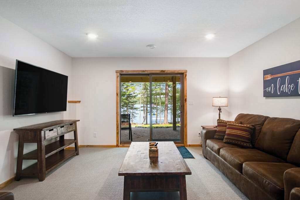 Gorgeous Lake Home With Private Pier, Beach, Firepit, Deck, & Grill + Water Toys - Eagle River, WI