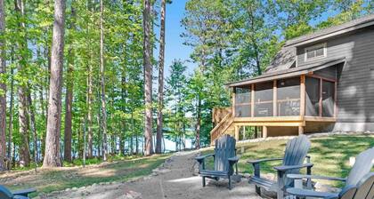 Gorgeous lake home with private pier, beach, firepit, deck, & grill + water toys
