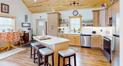 Lakefront home with, dock, kayaks, paddle boards, fire pit & more