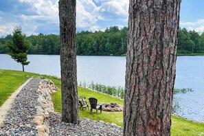 Property grounds - Lakefront home with private dock, deck, fireplace, firepit, canoe & paddleboat (Sayner)