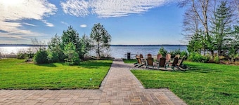 Dog-friendly lakefront home with firepit, 2 grills, fireplace, dock, & kayaks