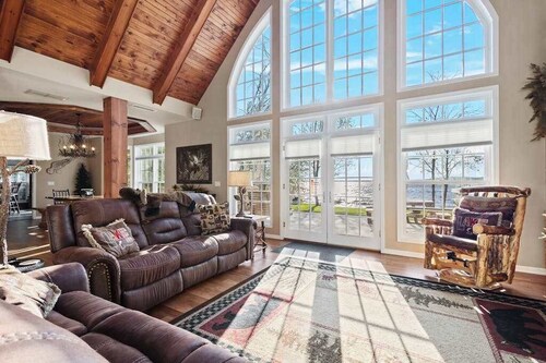 Lakefront retreat with hot tub, water view, game room, home theater & dock