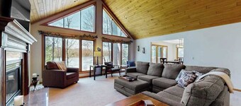 Dog-friendly lodging w/ scenic deck, pool table, lake dock, & free WiFi