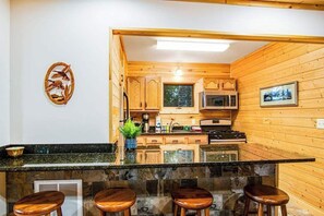 Fridge, microwave, oven, stovetop - Waterfront cabin with Plum Lake views, private dock, beach access & kayaks (Sayner)