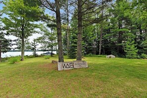 Property grounds - Large, waterfront home w/ a full kitchen, dock, canoes, & outdoor firepit (Tomahawk)