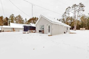 Exterior - Dog-friendly, tree-lined home on the snowmobile trail with streaming, W/D, & AC (Manitowish Waters)