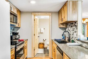 Fridge, microwave, oven, stovetop - Charming lakefront home with a private dock, gazebo, and W/D (Land O'Lakes)