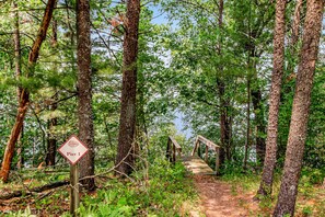 Property grounds - Secluded lake retreat with game room; near beach, boat rental, dining, and golf (Nekoosa)