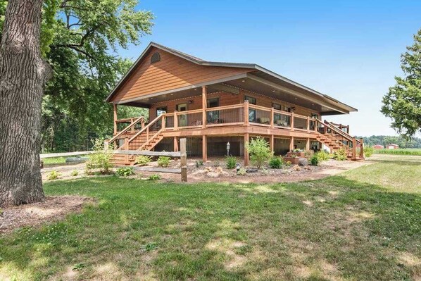 Exterior - Inviting home with game room, firepit, full kitchen, & W/D (Arkdale)
