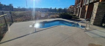 Second-floor hotel-style condo with fast WiFi, central AC, & kitchenette