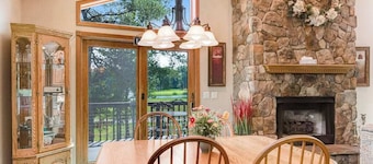 Golf course-front home with 2 pools, private beach, boat launches, tennis, grill