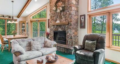 Golf course-front home with 2 pools, private beach, boat launches, tennis, grill