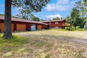 Exterior - Cozy wooded duplex w/ WiFi, full kitchen, shared W/D & near lakes & trails (Arkdale)