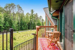 Outdoor dining - Newly-built condo on Duck Lake with decks, private dock, & firepit (Eagle River)