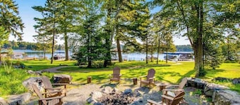 Newly-built condo on Duck Lake with decks, private dock, & firepit