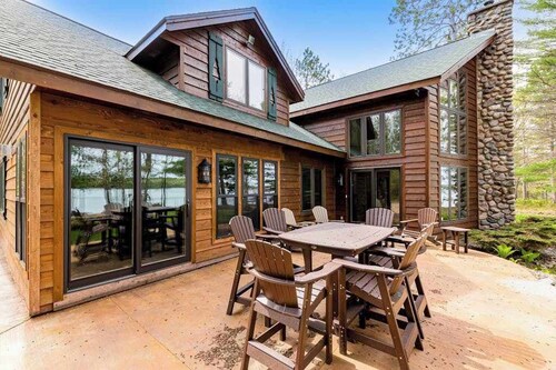 Lakefront home with game rooms, dock, kayaks, private beach, fireplace, firepit