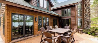 Lakefront home with game rooms, dock, kayaks, private beach, fireplace, firepit