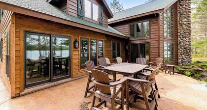 Lakefront home with game rooms, dock, kayaks, private beach, fireplace, firepit