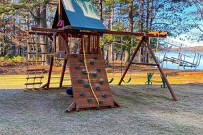 Children’s area - Lakefront home with game rooms, dock, kayaks, private beach, fireplace, firepit (Conover)