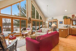 TV, fireplace, offices - Tranquil lakefront oasis with private dock, canoe, kayak, & three living areas (Arbor Vitae)