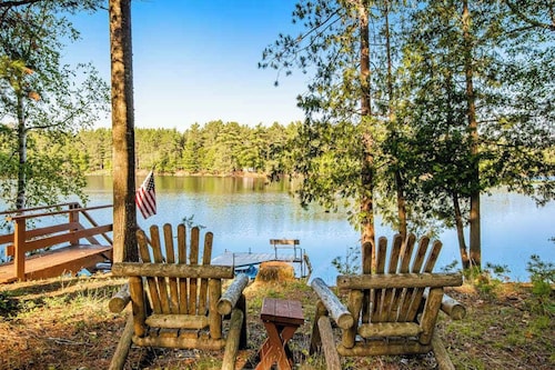Charming riverfront home with a fireplace, dock, washer/dryer  - close to town
