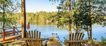 Charming riverfront home with a fireplace, dock, washer/dryer - close to town